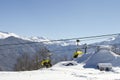Ski lift sunny day and blue sky background Caucasus mountains ski resort Rosa Khutor Russia