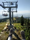 Ski lift tower and chairs at the top of Grouse Mountain, BC, Canada