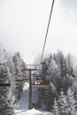 Ski lift under the mist Royalty Free Stock Photo