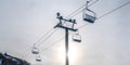 Ski lifts against sky with bright sun in Park City Royalty Free Stock Photo