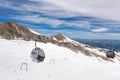 Ski lifts, cableway and slopes in high mountains. Kaprun glacier-Zell am see area, Austria Royalty Free Stock Photo