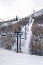 Ski lifts over snowy mountain in Park City Utah Royalty Free Stock Photo