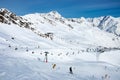 Ski lifts, skiers and snowboarders in Solden, Austria Royalty Free Stock Photo