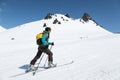 Ski mountaineer climb on skis on mountain