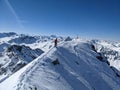 Ski mountaineering on the Fluela Wisshorn in Davos. Ski tour in Grisons mountains with fantastic view. Summit ridge
