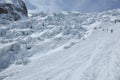 Ski mountaineering next to an ice fall Royalty Free Stock Photo