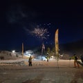 Ski at night with fireworks