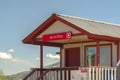 Ski Patrol building with stairs going to porch and red front door in Park City Royalty Free Stock Photo