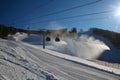 Ski piste and gondola lift and snow guns operating