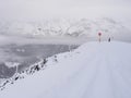 Ski piste and valley below