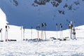 Ski poles in snow. Skiing equipment against snowy mountain in sk Royalty Free Stock Photo