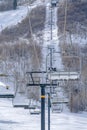 Ski resort with chair lifts covered with snow