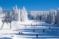 Ski resort Kopaonik, Serbia, lift, slope, people skiing Royalty Free Stock Photo