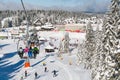 Ski resort Kopaonik, Serbia, people on the ski lift, mountains panorama