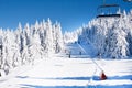 Ski resort Kopaonik, Serbia, ski lift, slope, people skiing Royalty Free Stock Photo