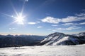 Ski resort.Ski slopes.Sunny day at the ski resort.Panoramic view on snowy off piste slope for freeriding with traces from skis, sn Royalty Free Stock Photo