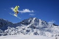 Ski rider jumping on mountains. Extreme freeride sport. Royalty Free Stock Photo