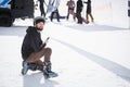 Ski rider takes pictures with smart phone camera