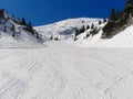 Ski run sunny winter landscape with mountains snow Royalty Free Stock Photo