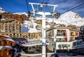 Ski slope and chairlift in the middle of the village, in Val Thorens Royalty Free Stock Photo