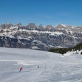 Ski slope and Churfirsten Range, view from Flumserberg Royalty Free Stock Photo