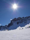 On the ski slope enjoying the sun in italian Dolomites mountains - good winter memories