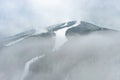 Ski slope mountain in fog, Medvedin resort, Czechia