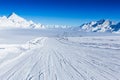 Ski slope in the mountains. Sunny winter landscape Royalty Free Stock Photo