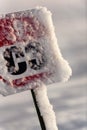 ski slope sign with snow