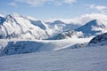 Ski slope in winter mountains Royalty Free Stock Photo