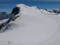 Ski slopes on mount small Matterhorn over Zermatt in the Swiss alps Royalty Free Stock Photo