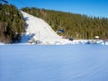 Ski slopes with skiers, snowboarders and chairlifts in Poland Royalty Free Stock Photo