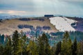 Ski slopes during a snowless winter in the mountains. Royalty Free Stock Photo