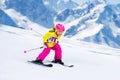 Ski and snow fun. Kids skiing. Child winter sport. Royalty Free Stock Photo
