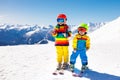 Ski and snow winter fun for kids. Children skiing. Royalty Free Stock Photo