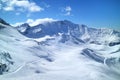 Ski and snowboard piste on fresh snow mountain slopes in French Alps .