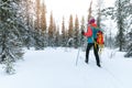 Ski touring in the deep fresh snow, Yllas, Lapland, Finland Royalty Free Stock Photo