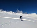 Ski touring track through the deep snow in a beautiful lonely mountain landscape. Sentisch Horn. Skimo Davos Switzerland