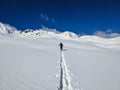 Ski touring track through the deep snow in a beautiful lonely mountain landscape. Sentisch Horn. Skimo Davos Switzerland