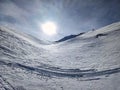 Ski touring track through the deep snow in a beautiful lonely mountain landscape. Ski tour slope. Skitour, Ski Tour