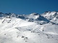Ski traces and ski slope in the mountains Royalty Free Stock Photo