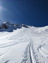 ski tracks on mountain bulenhorn monstein davos. beautiful deep snow descent in the snow. Ski touring in the mountains.