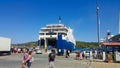 Skiathos, Greece - August 2023: Ferryboat at harbour at city of Skiathos at Skiathos island