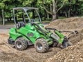 Skid loader with loaded gravel