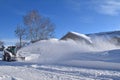 Skid steer blowing snow Royalty Free Stock Photo