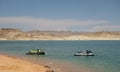 Skidoos on a reservoir in the desert