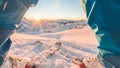 Skier athlete standing in front of wonderful sunset in ski resort - Winter extreme sport concept with person on top of the