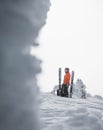 Skier in the backcountry of a snowy mountain landscape near Rossland Range, Canada