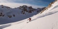 A skier carving fresh tracks on a pristine, snow-covered slope, concept of Powder skiing, created with Generative AI Royalty Free Stock Photo