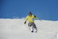 Skier cutting the snow on the mountain slope in wonderful resort Gudauri, Georgia